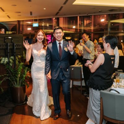 bride and groom walking to reception